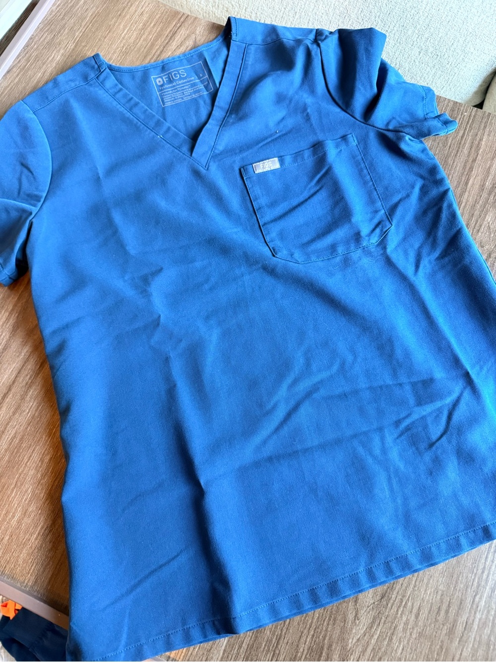 FIGS V-Neck Scrub Top in teal blue